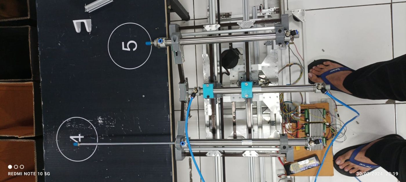 Top view of the pneumatic arms, stepper drivers and wiring