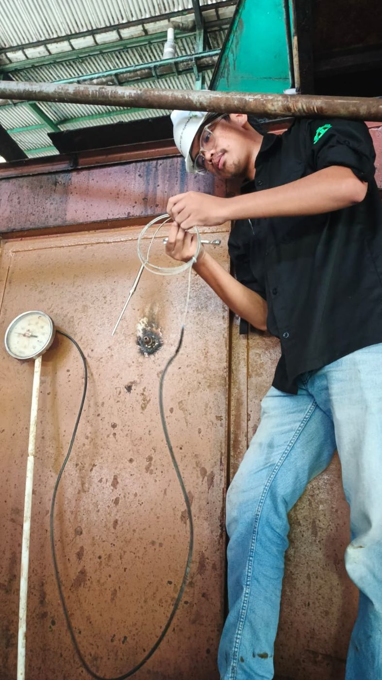 Installing a temperature probe on the silo wall